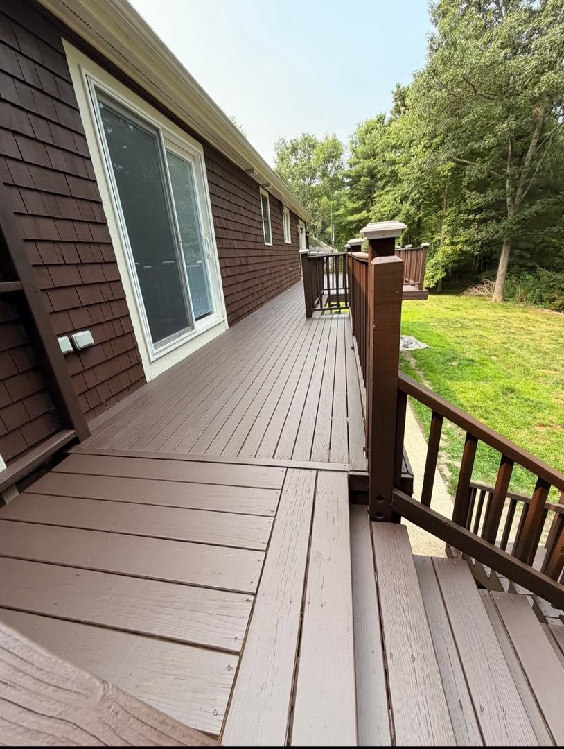 Deck Refinishing Staining – After 2 Refinished deck walkway and steps with new stain