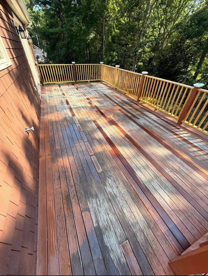 Deck Refinishing Staining – Before 1 Faded, weathered deck boards before deck refinishing