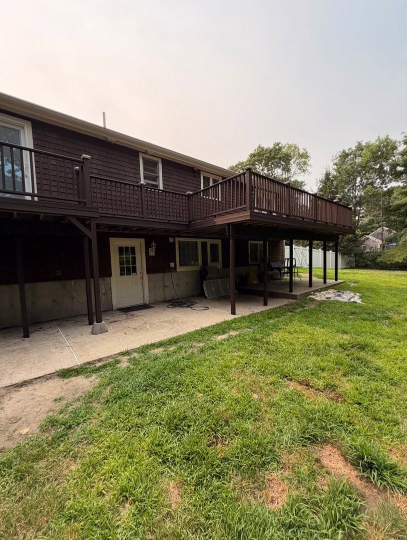 Deck Refinishing Staining – Before 4 Elevated deck with a faded finish before the deck refresh
