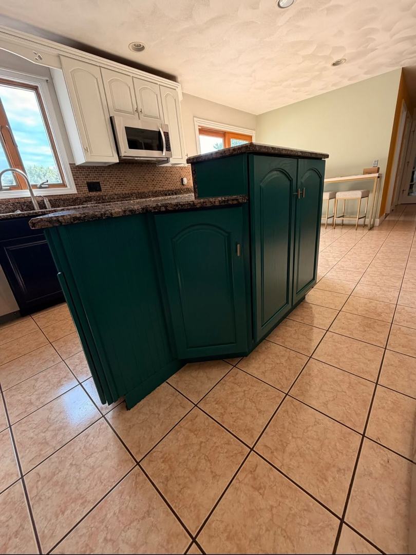 Kitchen Cabinet Painting – After 3 Teal painted kitchen island with granite countertop after professional cabinet painting
