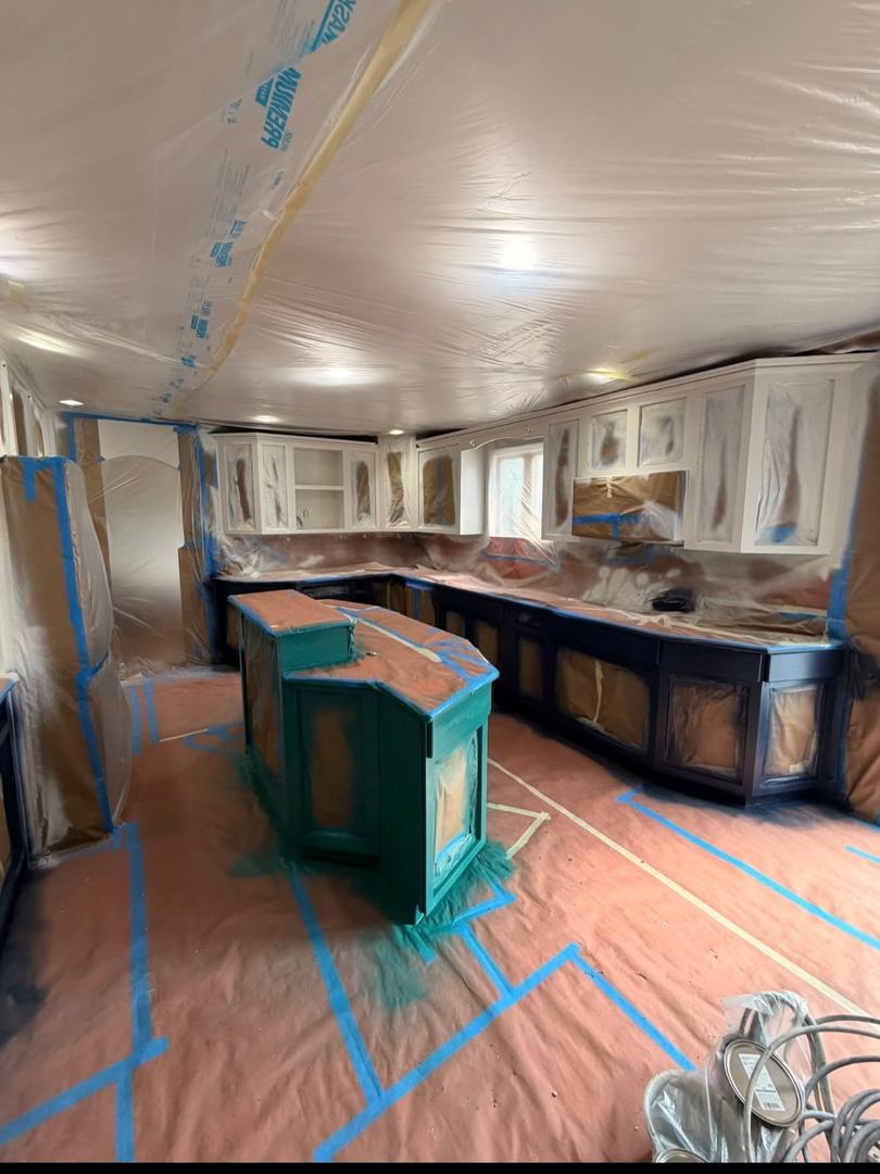 Kitchen Cabinet Painting – In Progress 1 Kitchen masked and protected during cabinet priming and spray painting